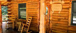 Rock away on the Porch at Homer's Place Log Cabin